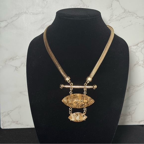 Jewelry - Elegant Gold Necklace with Textured Pendants